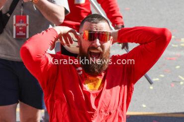 travis-kelce-receives-his-university-of-cincinnati-diploma,-chugs-a-beer-on-stage